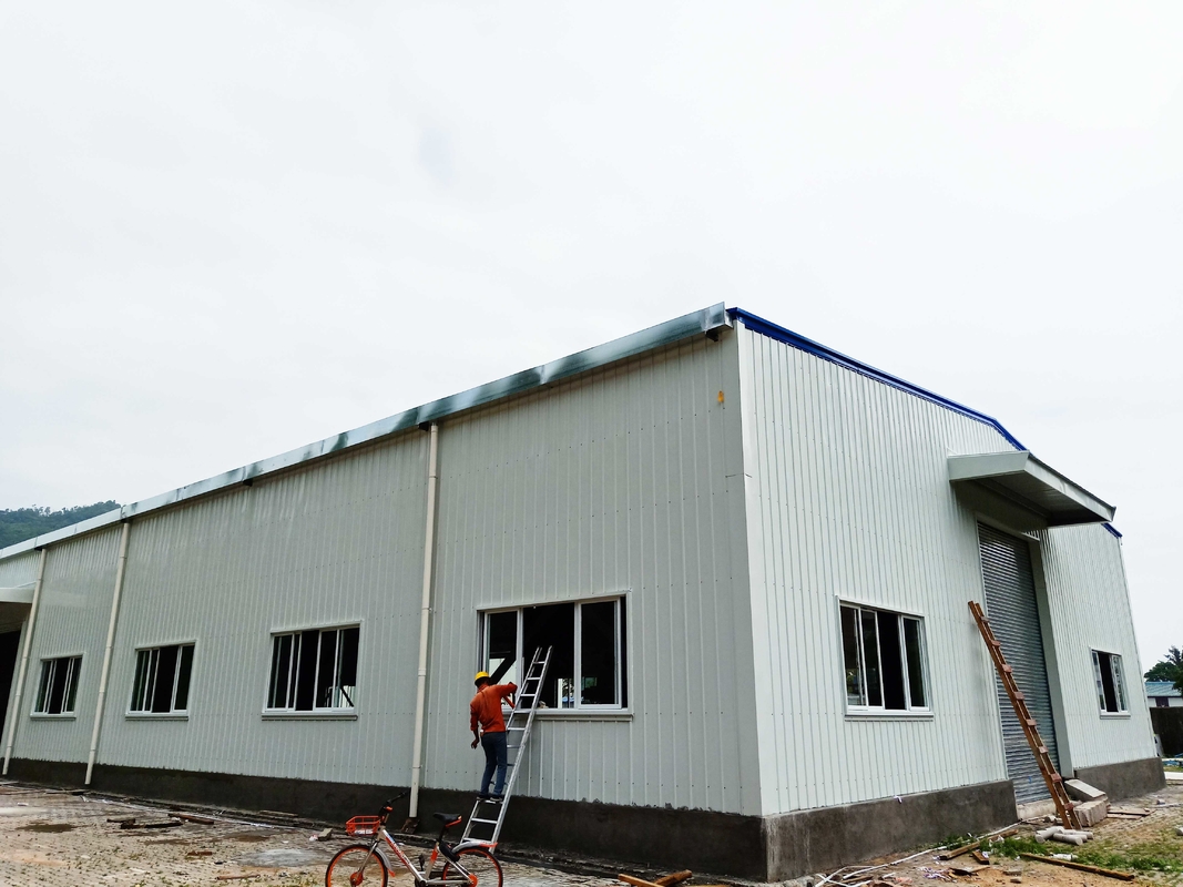 Fireproof Material Metal Steel Plate Steel Structure Building Warehouse With Electric Rolling Shutter Door