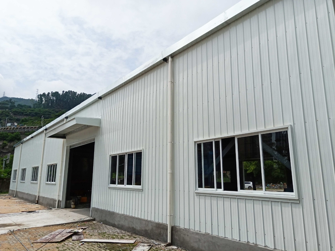 Fireproof Material Metal Steel Plate Steel Structure Building Warehouse With Electric Rolling Shutter Door