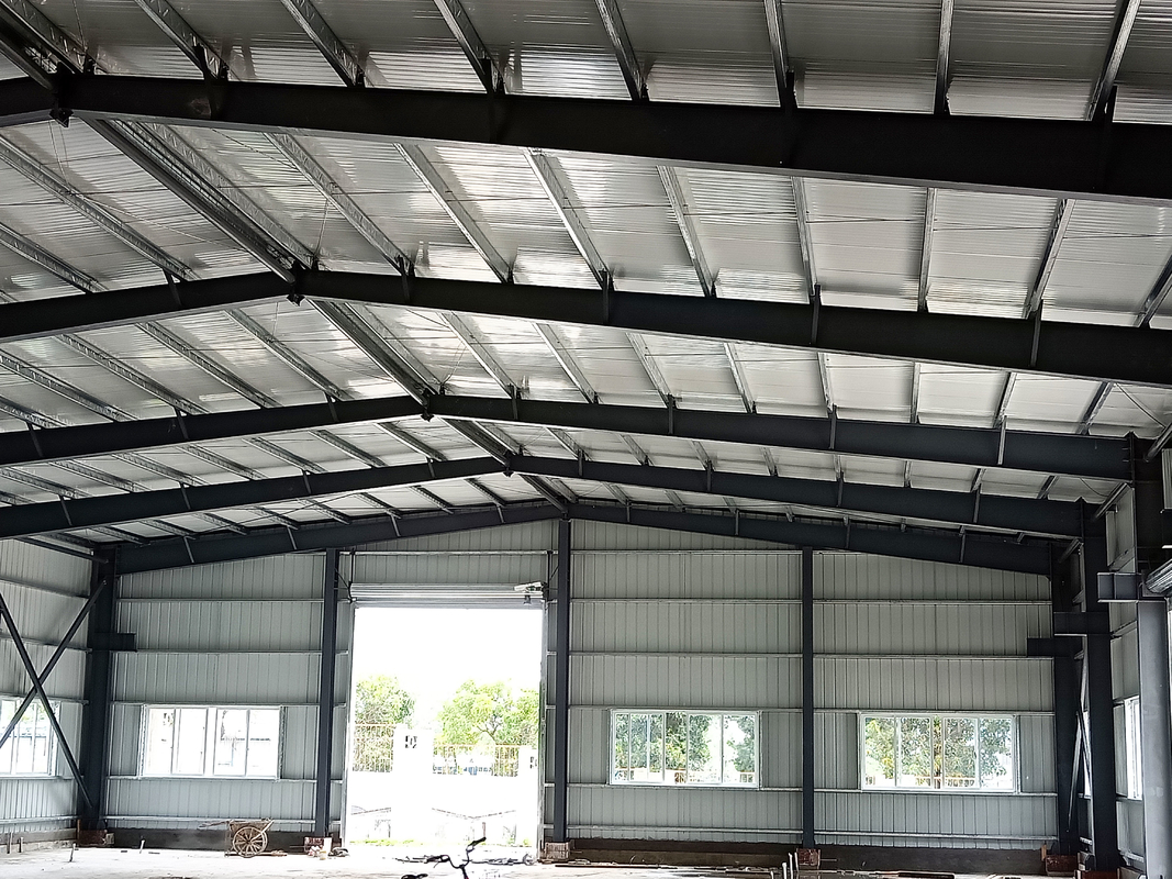 Fireproof Material Metal Steel Plate Steel Structure Building Warehouse With Electric Rolling Shutter Door