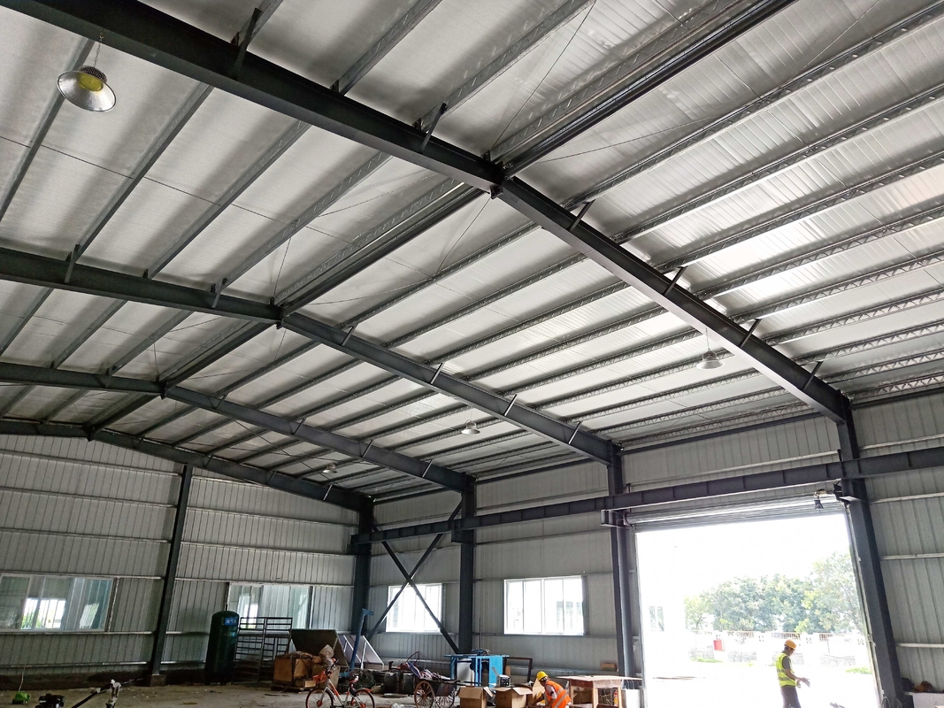 Fireproof Material Metal Steel Plate Steel Structure Building Warehouse With Electric Rolling Shutter Door